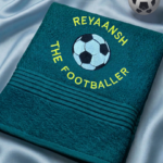 Petrol blue towel with football embroidery and custom name Reyaansh