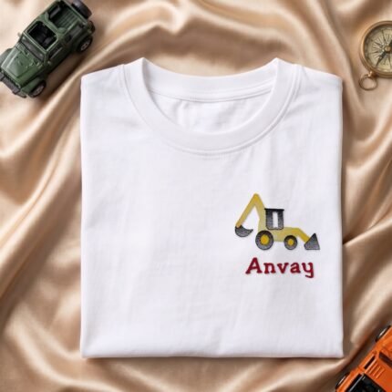Excavator pocket design embroidered kids tshirt in white, folded, with custom name