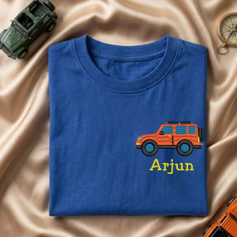 SUV Embroidery Royal Blue Kids Tshirt - Folded Folded royal blue kids t-shirt with small SUV embroidery and custom name Arjun on the left chest